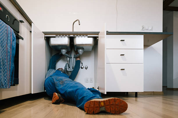 Professional Drain Cleaning technician working in Manchaug, MA